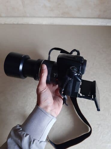 knopkalı: Fotoaparat Sony a500. Probeqi azdır. Şəkil çəkmək üçün knopkası — 4