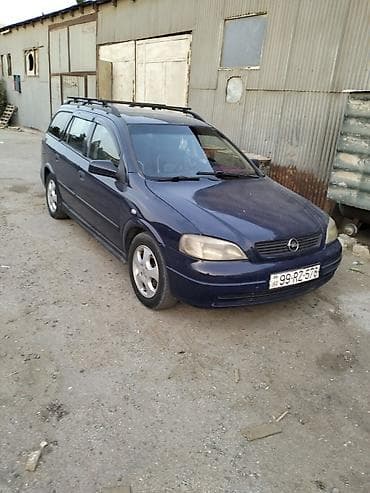 lapet satisi: Opel Astra Caravan (universal) – tünd mavi rəng. Xüsusiyyətlər: - — 1