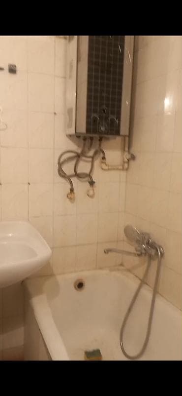 Nerimanovda keshle bazarina yaxin 2 otagki 3cu mertebe orta blokda — 2