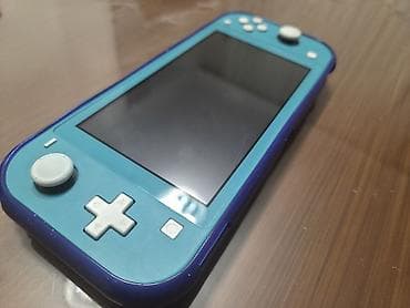 nintendo switch: Nintendo Switch Lite (mavi) - 12 oyun yüklü - 256 GB microSD kart - — 1
