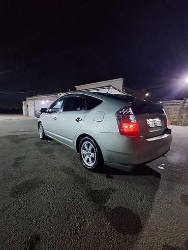 bmw m rol: Toyota Prius (2-ci nəsil) hibrid hetçbek - Hibrid benzin-elektrik güc — 3