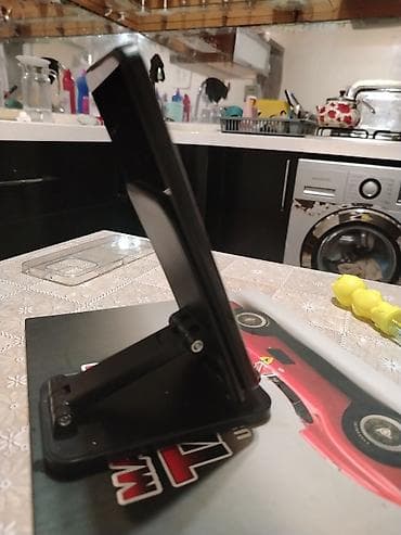 telefon saxlayan: Redmi A1+, 32 GB, rəng - Qara, Barmaq izi — 4