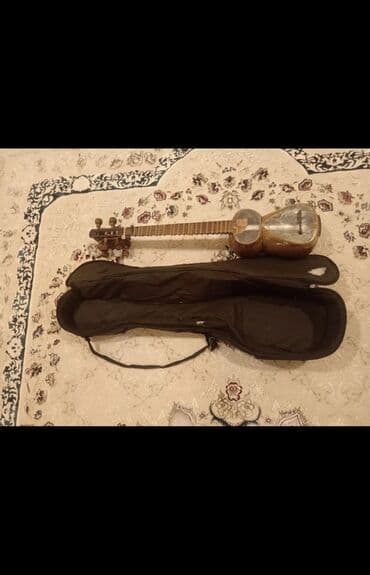 Tar – milli simli musiqi aləti - Korpus: iki kameradan ibarət, armud — 7