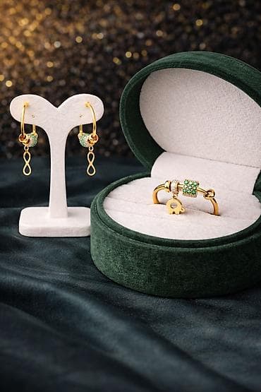 canta teze: Dəstə daxildir: Üzük, Sırğa, Sarı qızıl, 585 Əyar, 5 g — 7