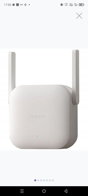 Ağ rəngdə, iki antenli Xiaomi Wi-Fi gücləndiricisi. Bu cihaz Wi-Fi