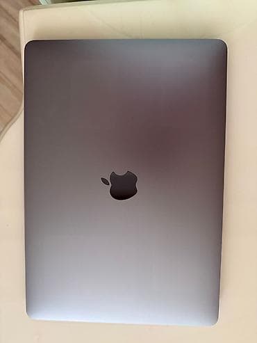 Apple Macbook Air 13 alinan gunden hec 10 defe istifade olunmayib