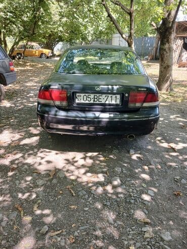 islenmis tekerler type 0 per page 40: Mazda 626 sedan Xüsusiyyətlər: - Güzgülərdə və kuzovda qara rəng - 4 — 3