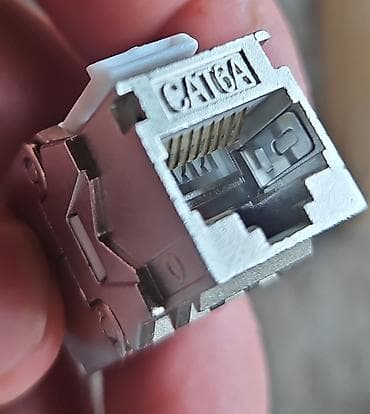 data nömrə: CAT6A ekranlı keystone jack dəsti Məhsul: CAT6A RJ45 keystone — 1