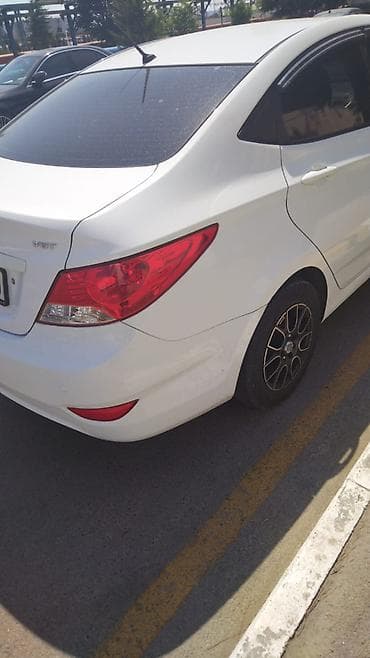 Hyundai Accent: 1.6 л | 2014 г. Седан — 2