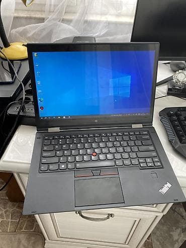 dinamik pioner: Lenovo ThinkPad Yoga seriyalı 2‑in‑1 noutbuk Xüsusiyyətlər: - 14" — 1