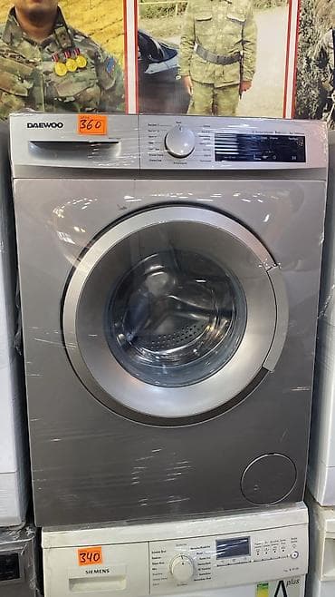 daewoo avtobus: Daewoo ön yükləmə paltaryuyan maşın - Korpus: gümüş rəng, ön tərəfdən — 1