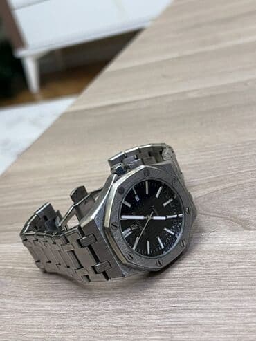 Eynəklər: Qol saatı, Audermars Piguet — 2