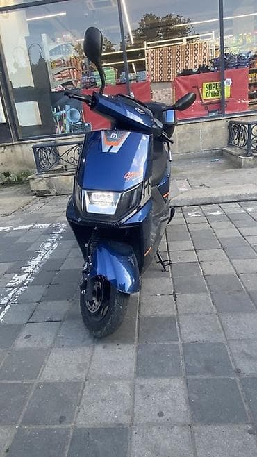 Elektrik skuter – şəhər içi rahat və səssiz hərəkət üçün - Rəng: tünd — 1