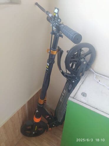samakat islenmis: Qara və narıncı rənglərdə olan "City Riding" markalı skuter — 4