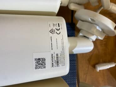 mini gizli kamera kablosuz: Ağ rəngdə Hikvision şəbəkə kamerası. Bu kamera dəsti ev, ofis və ya — 4