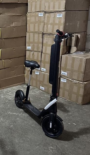 elektro gitarlar: X 8 modelioturacaqlı qara elektrik skuter. Bu model səyahətlər və — 2