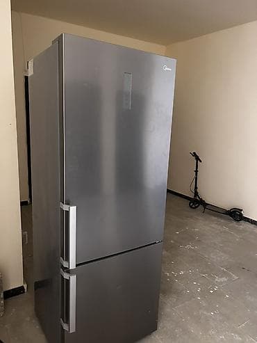 1 il zəmanəti var kontakt homede.Midea ikikameralı soyuducu