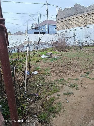 dəmir metal: 2 mertebe 250 kv 8 otaq 4 aşağı 4 yuxarı Market əsas yola 200 metr — 4