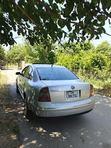 opel vektra a: Volkswagen Passat: 1.8 l | 2001 il Sedan — 7
