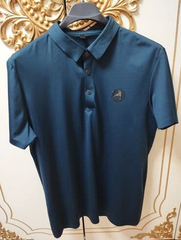 oriflame kisi etirleri qiymetleri: - Məhsul: Kişi polo köynəyi - Rəng: Tünd mavi/teal - Dizayn: Klassik — 1