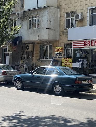 ford 8 1: BMW 5 series: 2.5 l | 1988 il Sedan — 1
