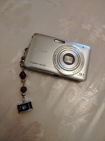 nokia dual sim: Məhsul: Sony Cyber-shot rəqəmsal fotoaparat - Gümüşü korpus, arxa — 3