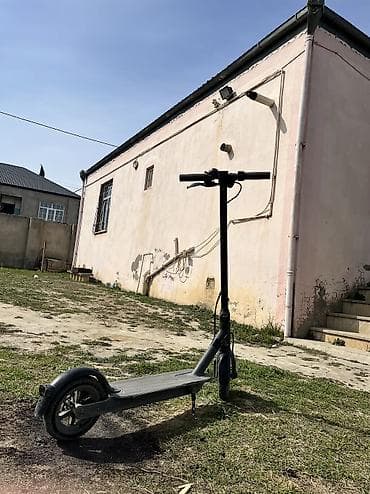 Elektrik nəqliyyatı: Elektrik skuter – şık qara dizayn, şəhərdaxili rahat hərəkət üçün — 2