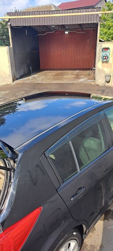 faizsiz kreditlə maşın: Nissan Tiida avtomobili hər gün rahat istifadə üçün nəzərdə tutulmuş — 18