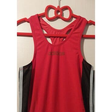 bədii gimnastika üçün kupalniklər: Güləş trikosu,yenidir,baha alinib,matriali davamlidir — 2