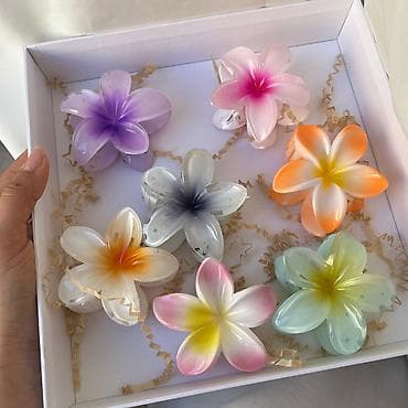 sarı saç: 2azn - 4azn Məhsul: Çiçək formalı saç sıxacları (krab klips) Təsvir — 2