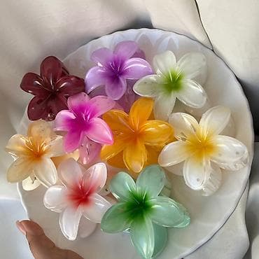 sarı saç: 2azn - 4azn Məhsul: Çiçək formalı saç sıxacları (krab klips) Təsvir — 4