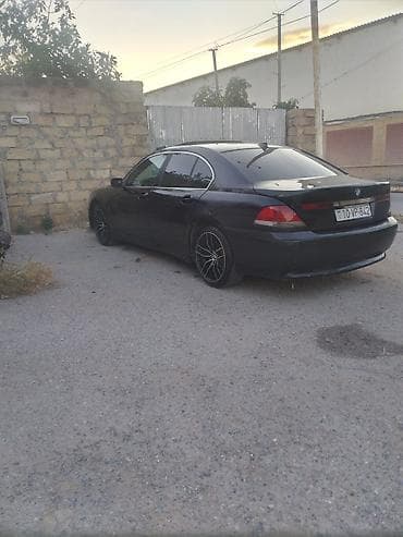 bmw e39 radiator: BMW 7 Series (E65) sedan – qara rəngdə, arxa ötürməli lüks biznes — 2