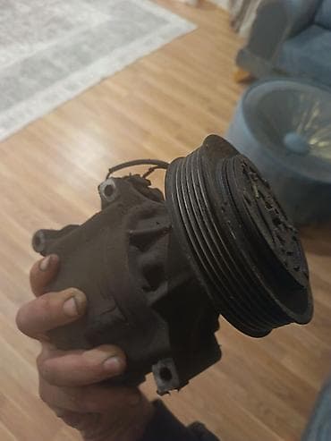 Avtomobil kondisioner kompressoru - Mexaniki kasnaq/sürgüclə