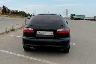 kia rio manitor: Daewoo Lanos, 5 qapılı hetçbek, qara rəng. - Yanacaq: benzin - — 2