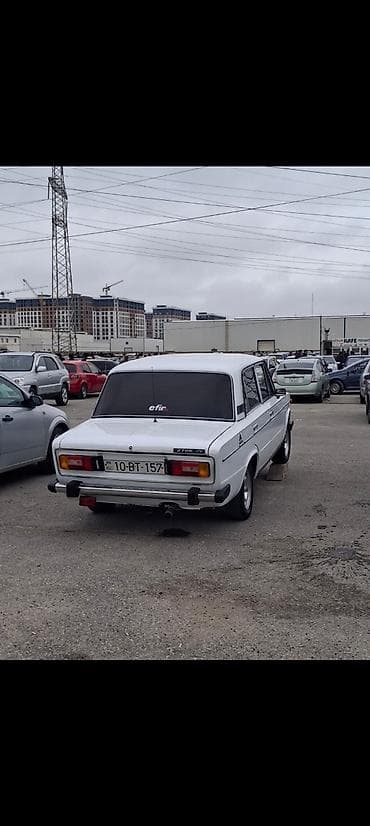 VAZ 2106, ağ rəng, sedan kuzov. Xüsusiyyətlər: - Klassik “2106”