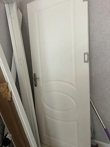 2 el qapilar: Ağ rəngli daxili otaq qapısı - Material: MDF/taxta əsaslı, hamar boya — 1