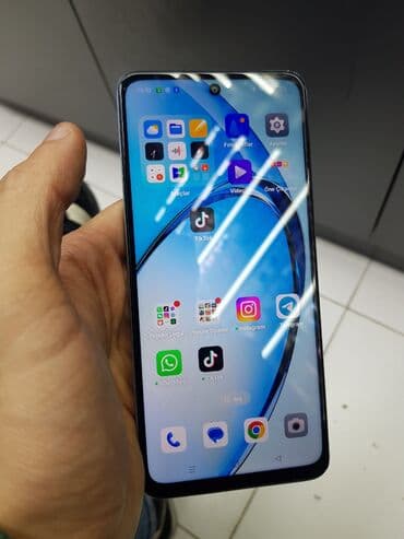 işdenmiş telefon: Oppo A3x, 128 GB, rəng - Mavi, Barmaq izi — 1