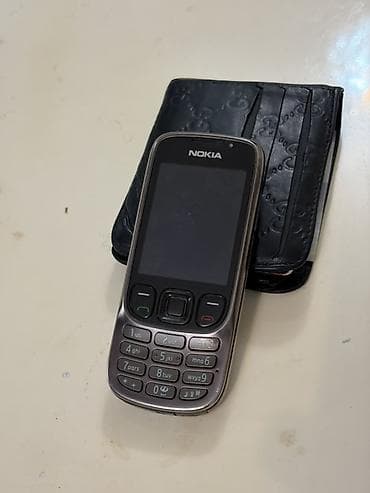 nokia 67 00: Nokia rəng - Qəhvəyi, Düyməli — 2