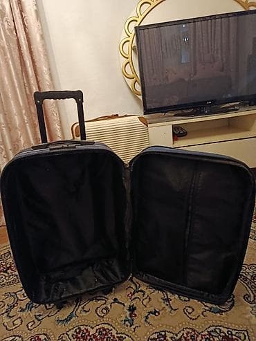 islenmis camadan: Təkərli əl yükü/orta ölçülü tekstil çamadan Uzunluq 60 sm En 40 sm — 3