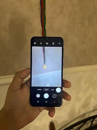 telefonların satisi: Samsung Galaxy A30, rəng - Qara, Barmaq izi — 4