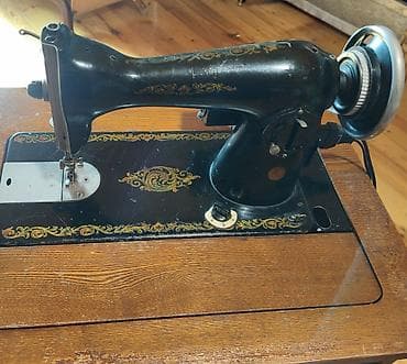 Elektrik ayaq pedallı tikiş maşını və qatlanan taxta kabinet dəsti -