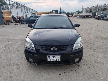 kia cerato 2010: Kia Rio hatchback – qara rəng, 5 qapı. Xüsusiyyətlər: - Kuzov — 1