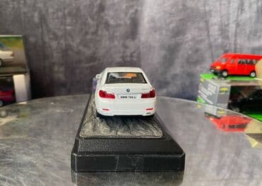 metbex tavan modelleri: Коллекционная модель BMW 750i F02 white 2008 RASTAR Scale 1:43 Art — 14