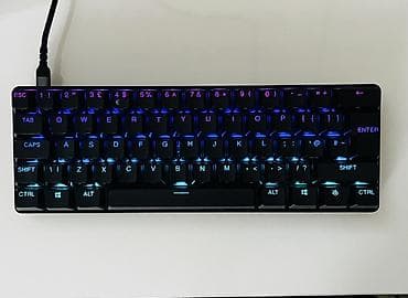 SteelSeries Apex 9 Mini oyun klaviaturası. Qara rəngdədir, yığcam 60% — 6