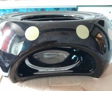 demir qab: Подставка под чайник и кастрюлю.греет свечой.
4 азн — 2