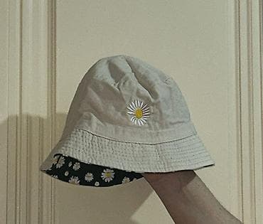 Iki tərəfli dizaynı olan papaq keçen yay 15 manata alınıb tezedir -