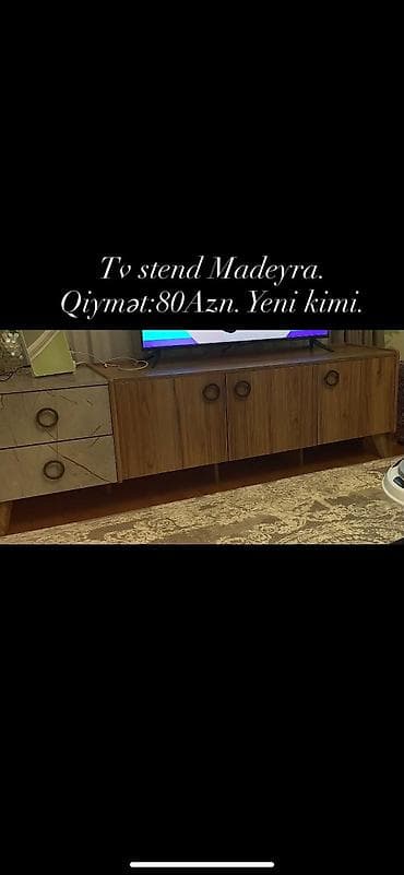 divarda kitab refleri: Yeni tv stend. 80azn ünvan qaracuxur *Tehi — 1