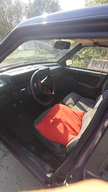 w210 salonu: LADA Samara (VAZ 21099) sedan - Kuzov: 4 qapılı sedan, tünd bənövşəyi — 4