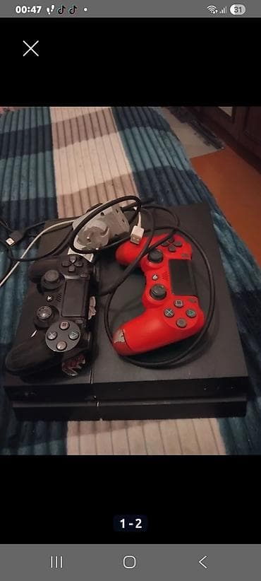 PlayStation 4 (PS4) oyun konsolu seti - Model: Sony PlayStation 4