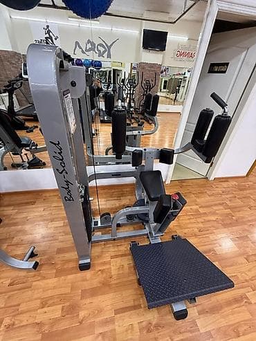 Body-Solid markalı trenajor – qarın və yan əzələlərin